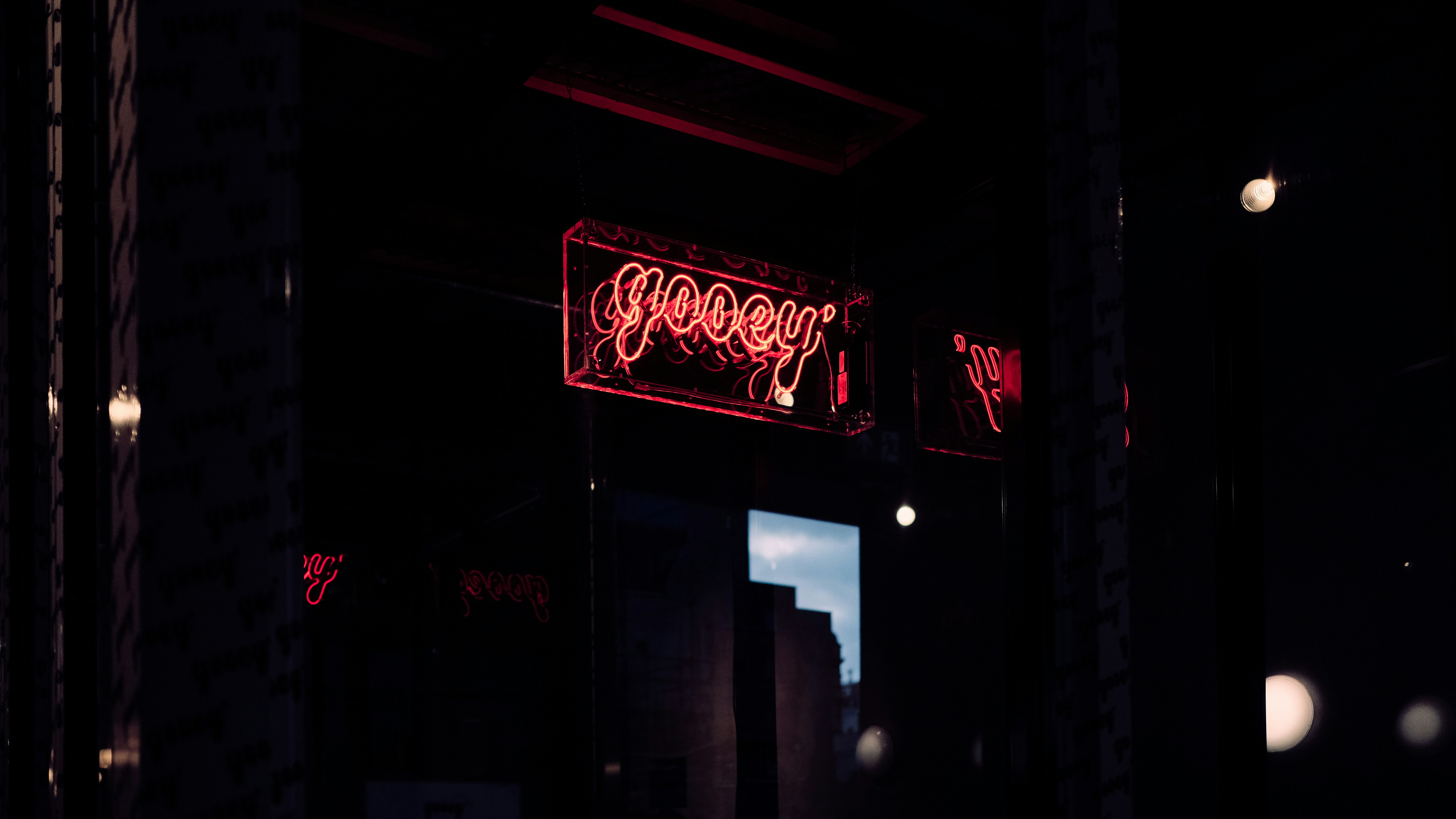 red and white UNKs neon light signage